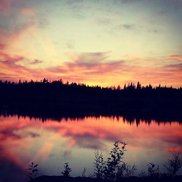 Evening autumn sunset reflection on lake in interior Alaska #Adventure
