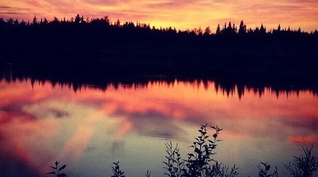 Evening autumn sunset reflection on lake in interior Alaska #Adventure