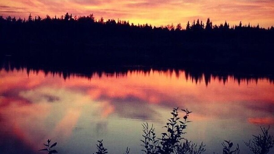 Evening autumn sunset reflection on lake in interior Alaska #Adventure