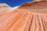 A layered rock formation with distinct horizontal strata.