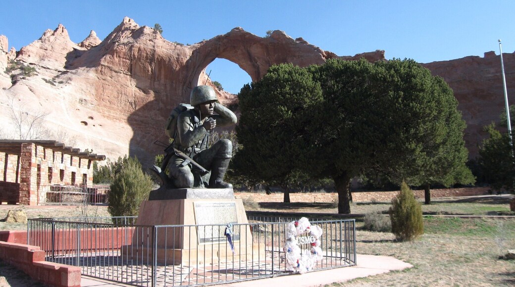 This memorial dedicated to the Navajo Code Talkers (Wind Talkers) is located within Window Rock Tribal Park.
Speaking in their own language the Wind Talkers were responsible for the taking of Iwo Jima during World War II. Learn more at http://navajonationparks.org/htm/veterans.htm . Located about 20 miles North of Highway 40 within the Navajo Nation it is well worth a visit.
