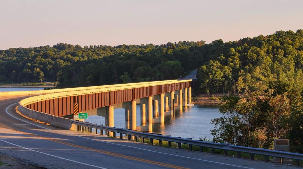 Looking out over Norfork Lake as the evening sun shines on the Hwy. 101 Bridge in Gamaliel, Arkansas