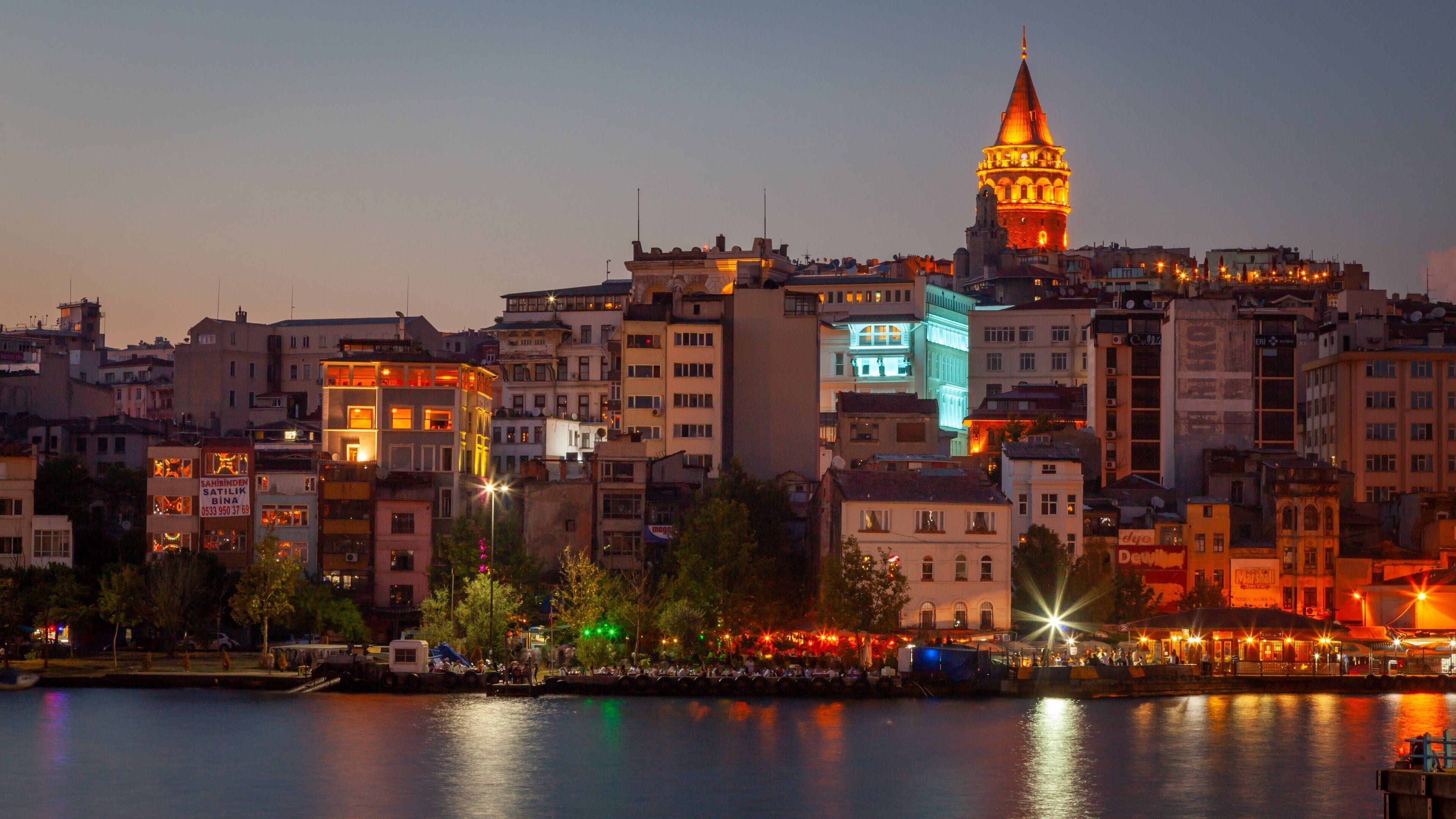 Galata Tower featuring night scenes, skyline and a city
