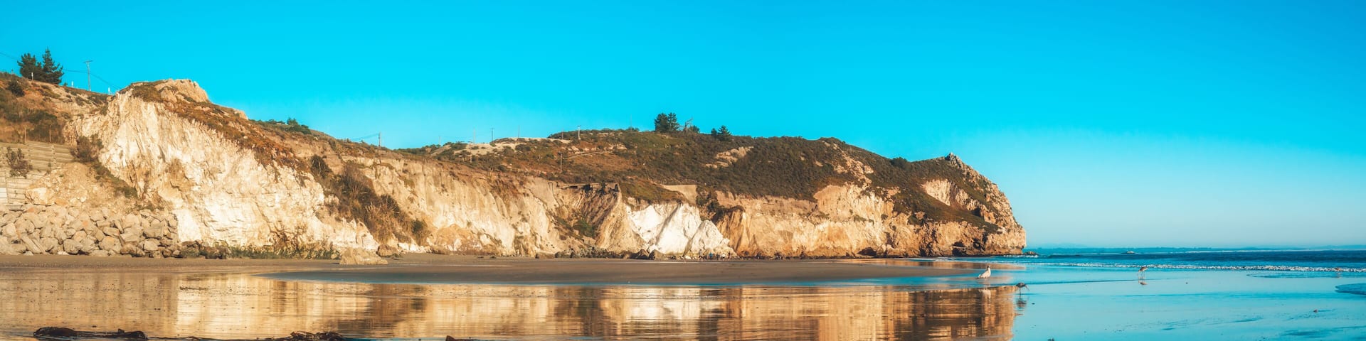 Avila Beach cliffs at sunset, panorama. San Luis Obispo County, beautiful Central Coast of California