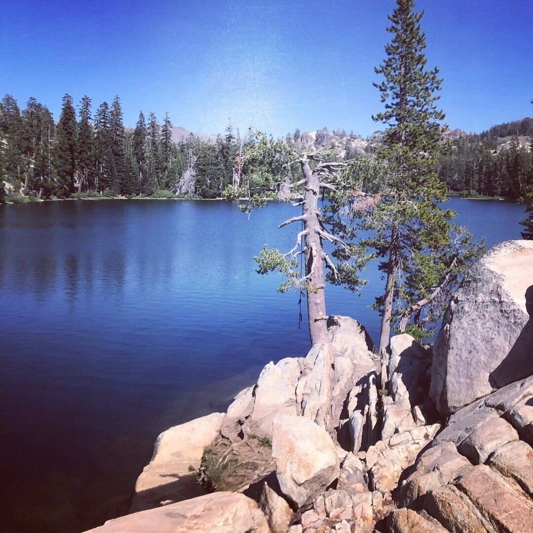 Easy kayak paddle around this beautiful little lake. Crystal blue water, granite slabs and cabins dot the shoreline. 
