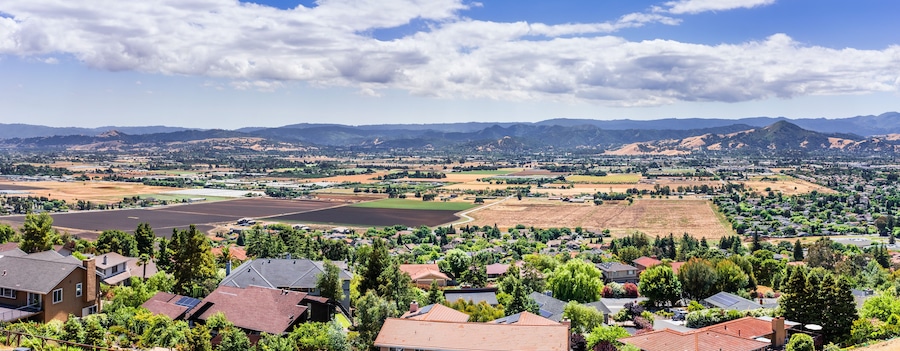 Panoramic view of Morgan Hill, a mainly residential and agricultural town in Santa Clara County, California; residential neighborhood visible in the foreground