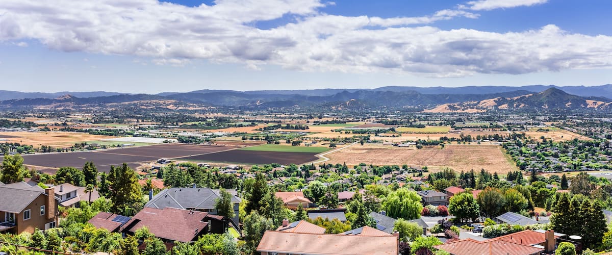 Panoramic view of Morgan Hill, a mainly residential and agricultural town in Santa Clara County, California; residential neighborhood visible in the foreground