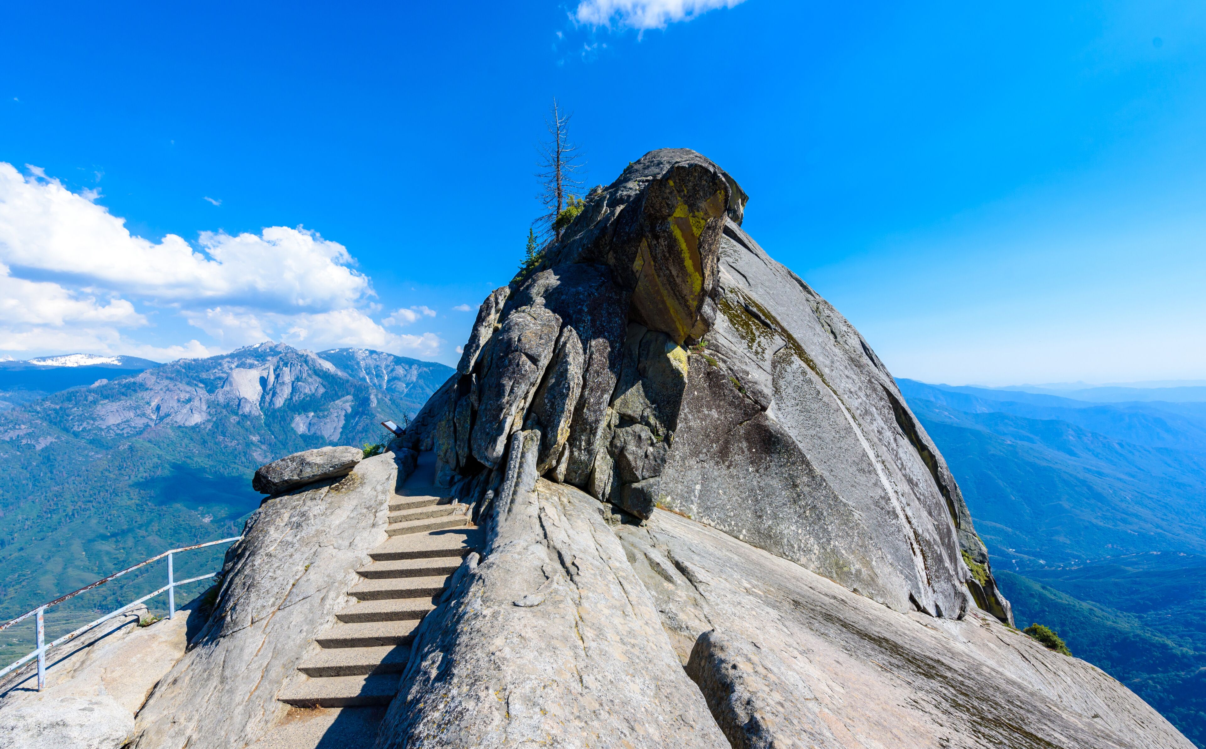 Hike on Moro Rock Staircase toward mountain top, granite dome rock formation in Sequoia National Park, Sierra Nevada mountains, California, USA