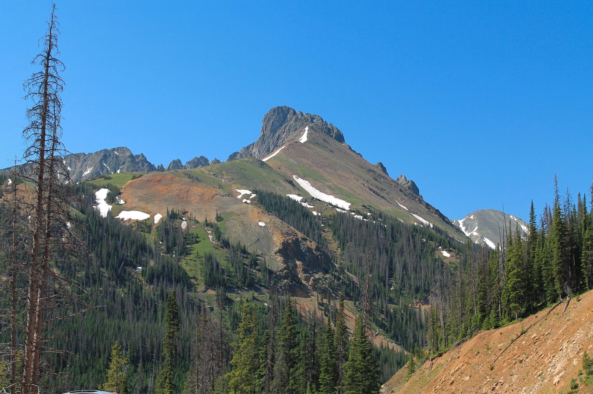 Another stunning view along Cache la Poudre Scenic Drive. I'd rate this drive a 4 out of 10 on a Top Ten list for things to do near Rocky Mountain National Park, it's that beautiful. You come to this view between the Continental Divide and State Forest State Park. I think this is Owl Mountain. #colorado #RockyMountain #mountain #EndlessSummer #blue #colorful 