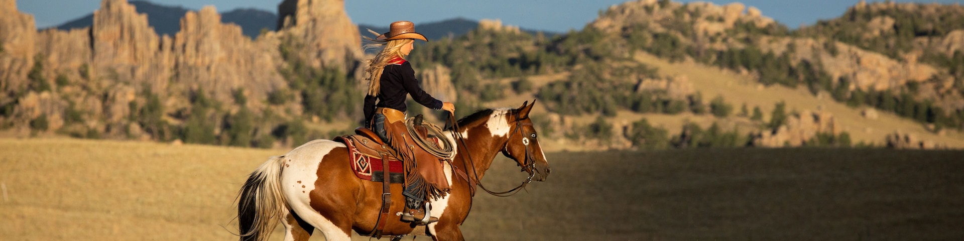 Cowgirl on Paint Horse