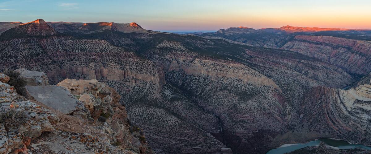Last light on the desert mountains above the beautiful river canyons of Dinosaur National Monument at sunset.