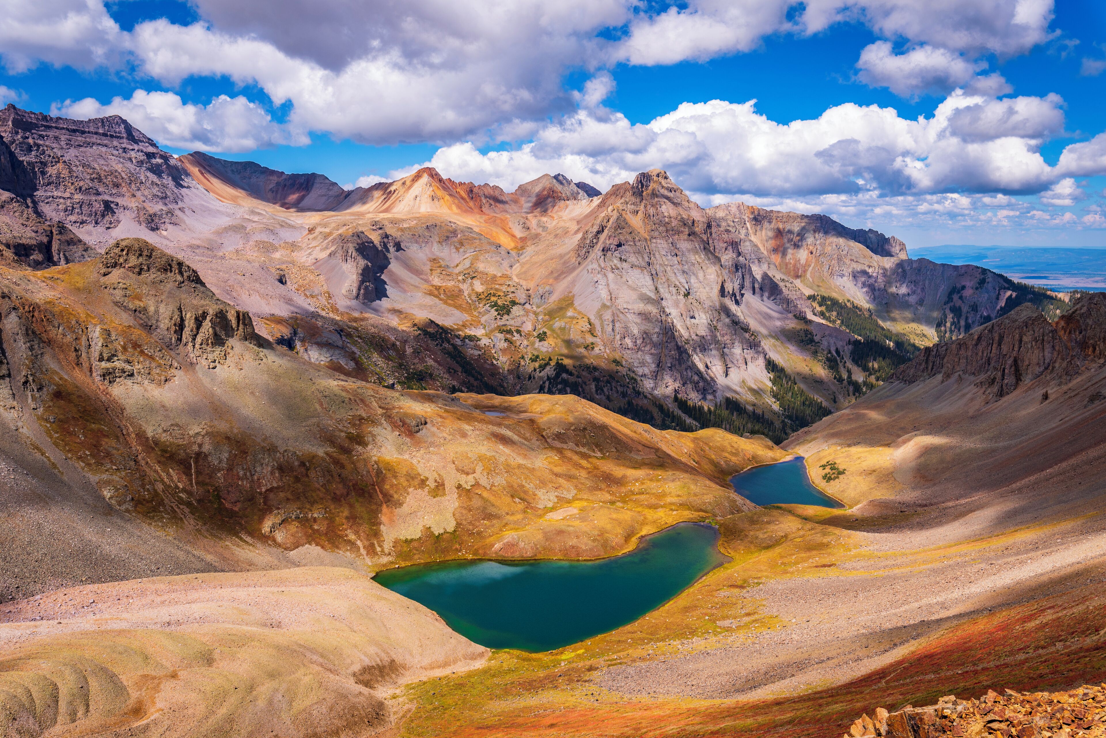 The Blue Lakes in the San Juan Mountains are great for a day hike. 

View from the rim to Mt. Sneffels at an altitude of 3902m (12,793 ft). 
The photo shows upper and middle blue lakes. You can get a view of all three blue lakes from the summit of Mt. Sneffels (4315m / 14,157 ft.).

Must be even better in the summer months, when all the flowers are still their bloom and the mountains are covered with snow. 

#GreatOutdoors
#Nature
#Adventure