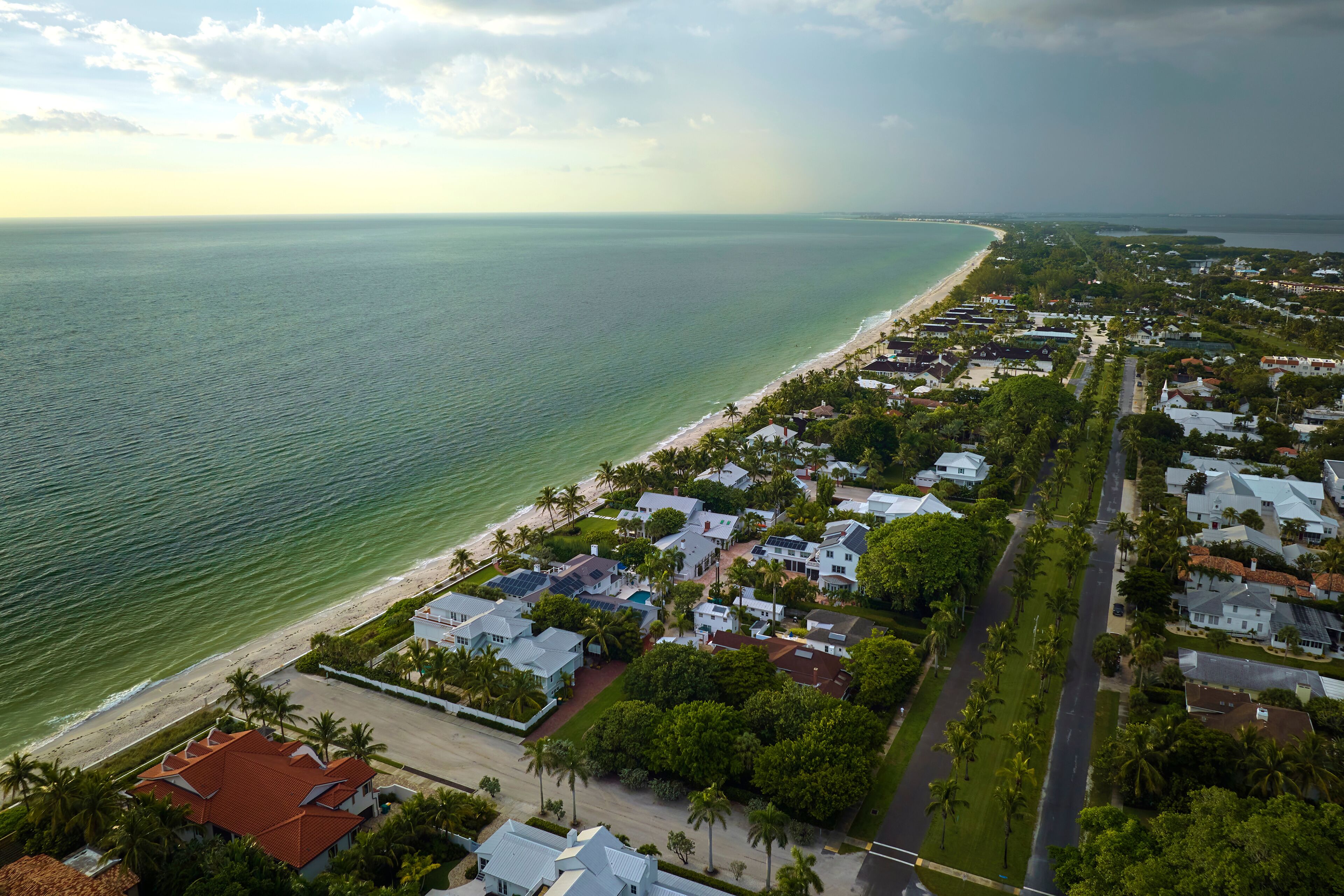 Aerial view of expensive residential houses in island small town Boca Grande on Gasparilla Island in southwest Florida. American dream homes as example of real estate development in US suburbs
