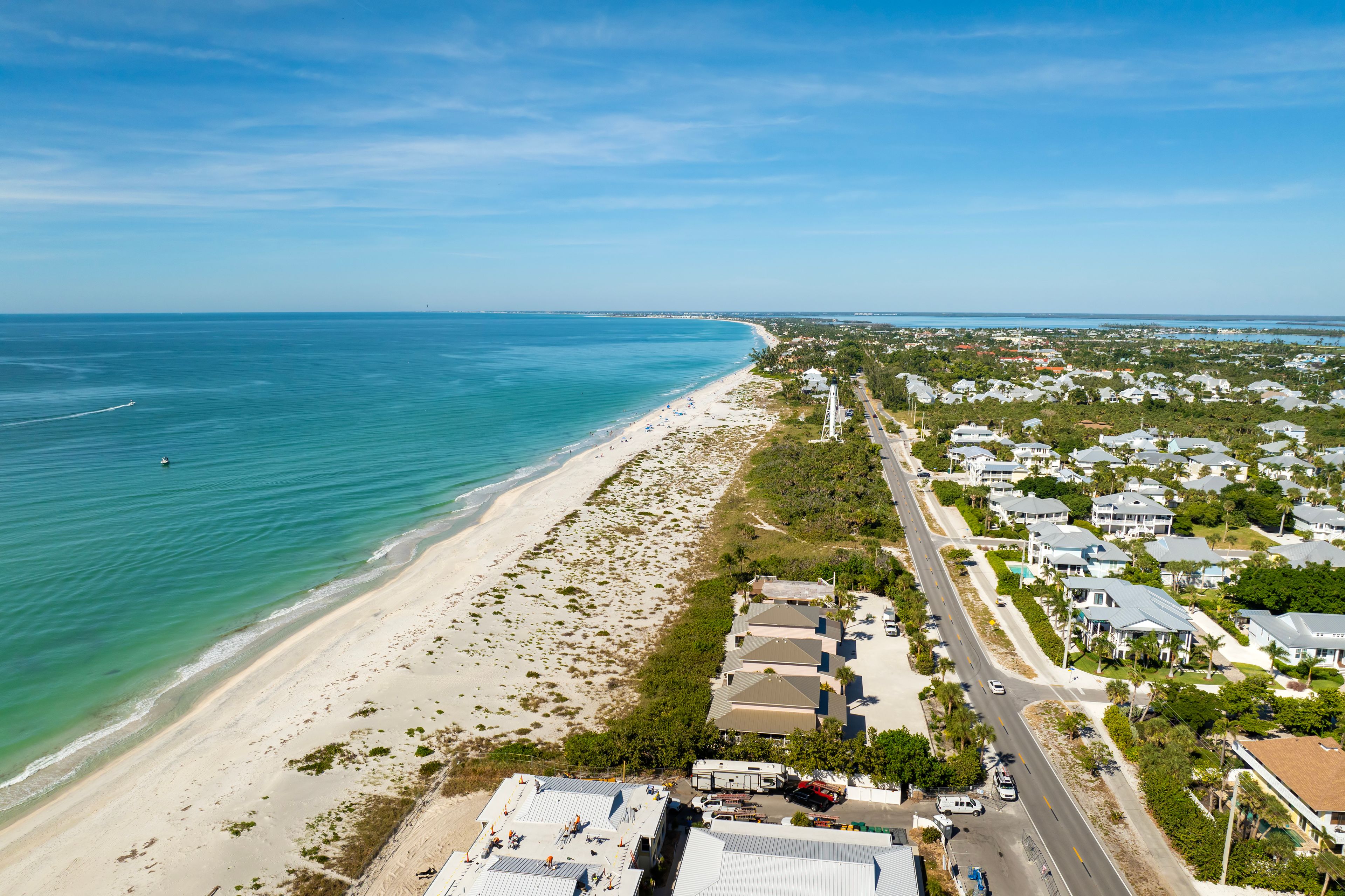 Large residential homes in island small town Boca Grande on Gasparilla Island in southwest Florida. American waterfront houses in rural US suburbs