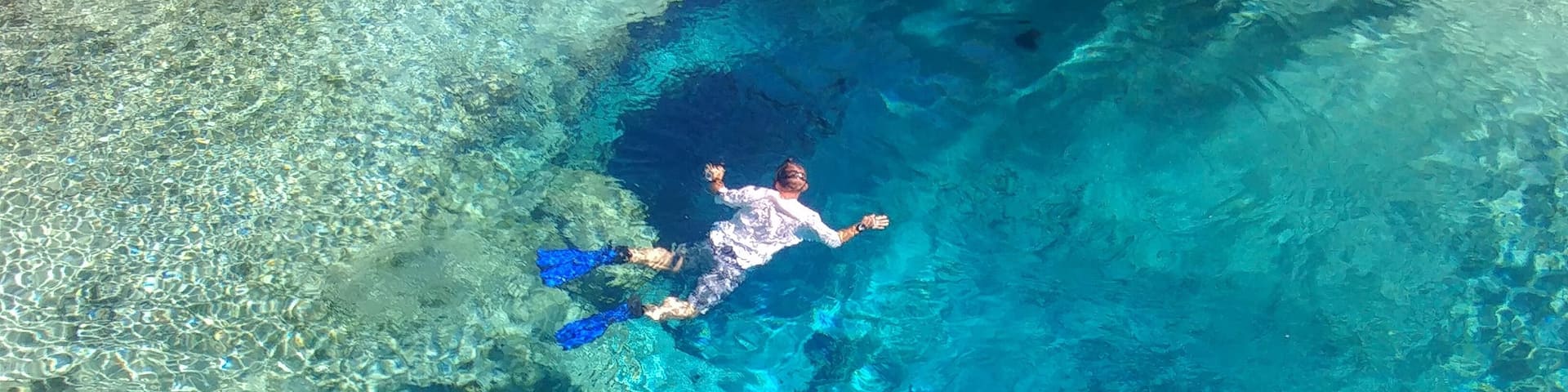 My boyfriend Joe went for an early morning swim in the springs. We were camping in the park for the weekend. I took this from the jumping platform.