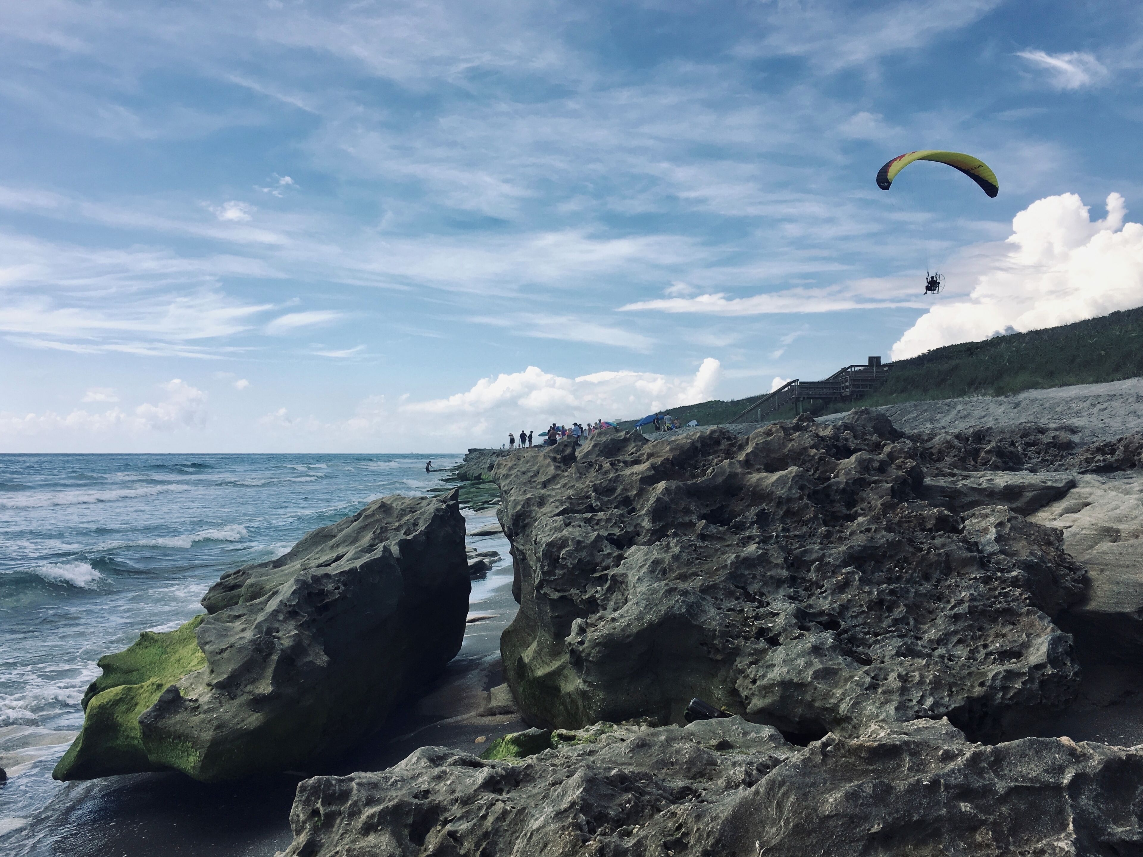 Blowing Rocks Preserve is an environmental preserve on Jupiter Island in Hobe Sound. It contains the largest Anastasia limestone outcropping on the state&#x27;s east coast. Not often we get to see rocky outcrops on Florida beaches and the powered parachute was the icing on the cake...