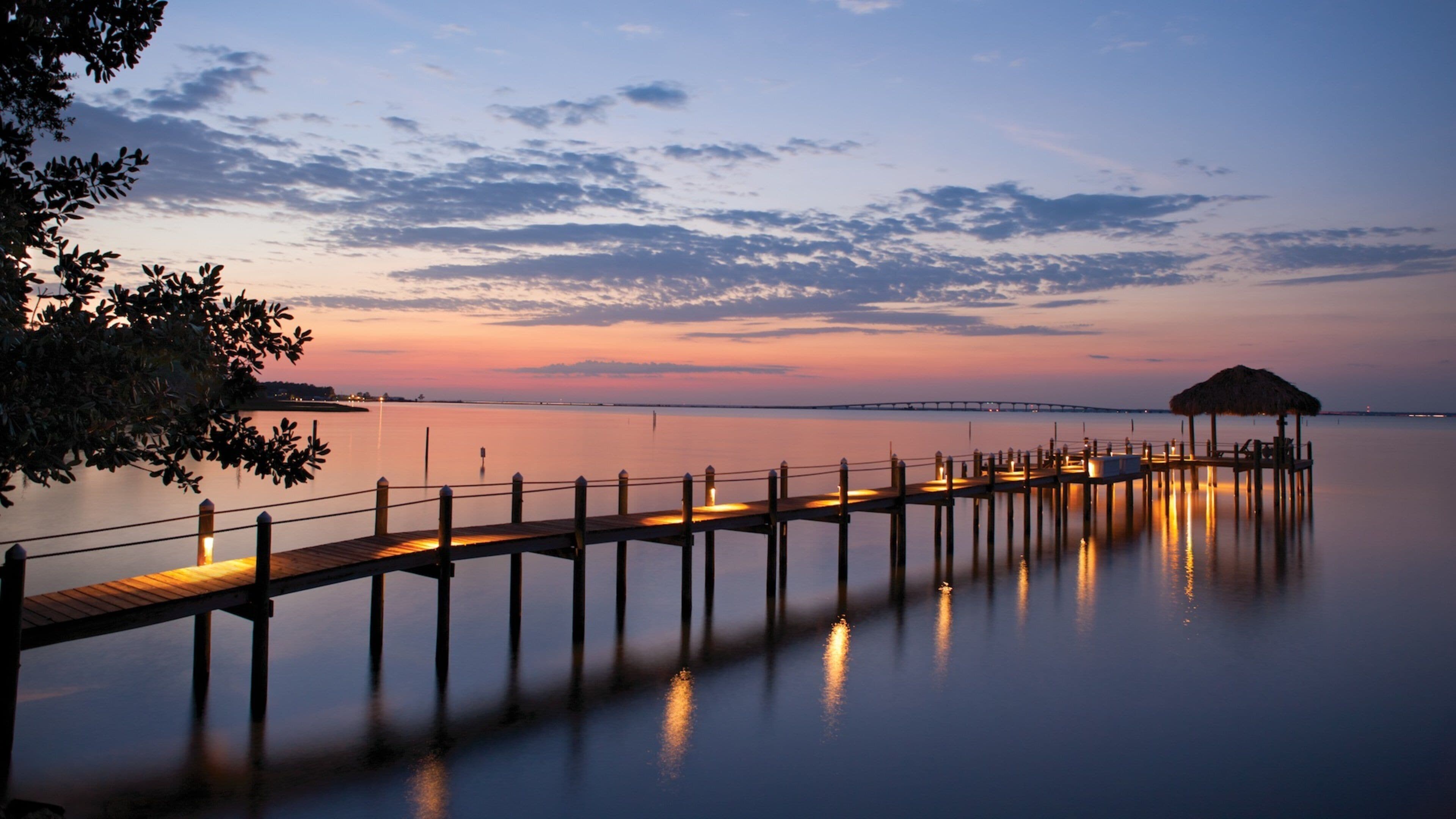 Santa Rosa Beach mit einem allgemeine Küstenansicht und Sonnenuntergang