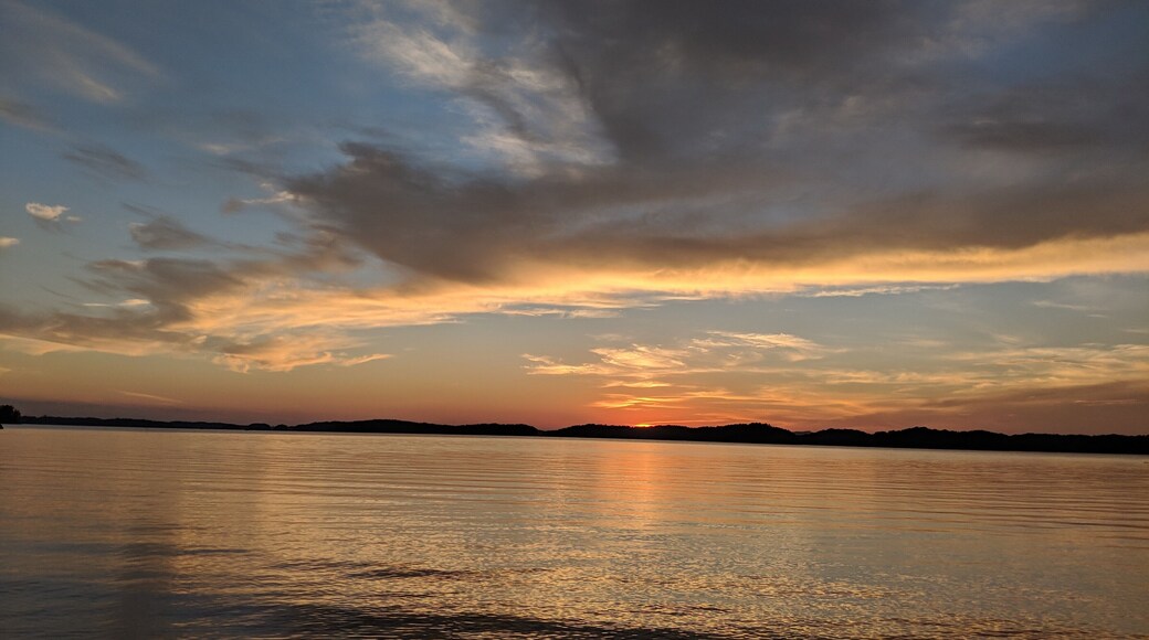 Beautiful sunset over the calm Waters from campsite