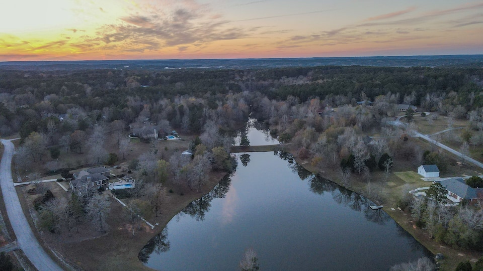 Aerial sunset landscape of forest and suburban neighborhood in Grovetown Augusta Georgia