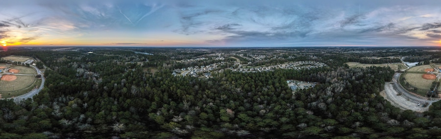 Aerial sunset landscape of forest and suburban neighborhood in Grovetown Augusta Georgia