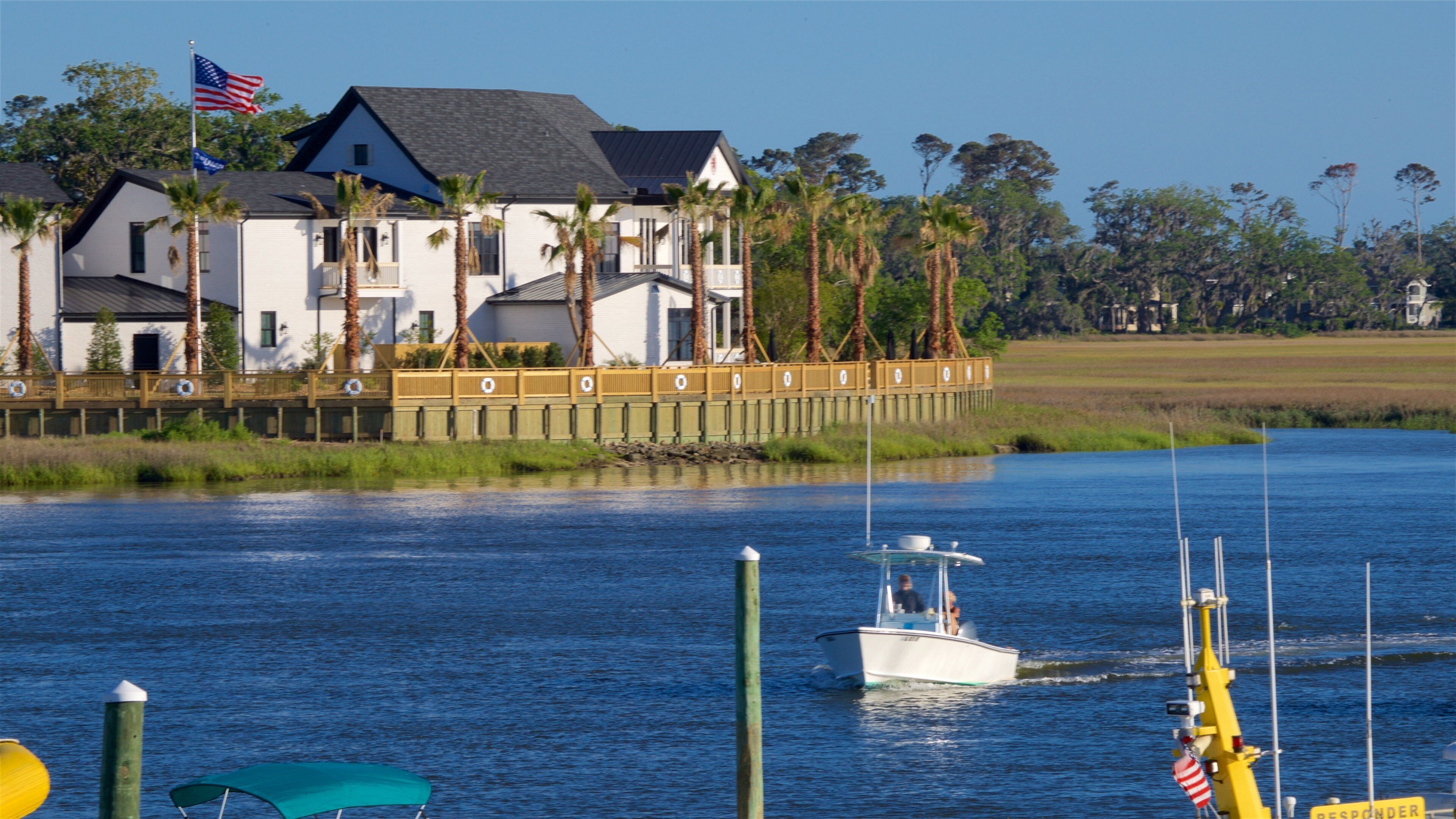 St. Simons Island which includes boating, a bay or harbor and a house