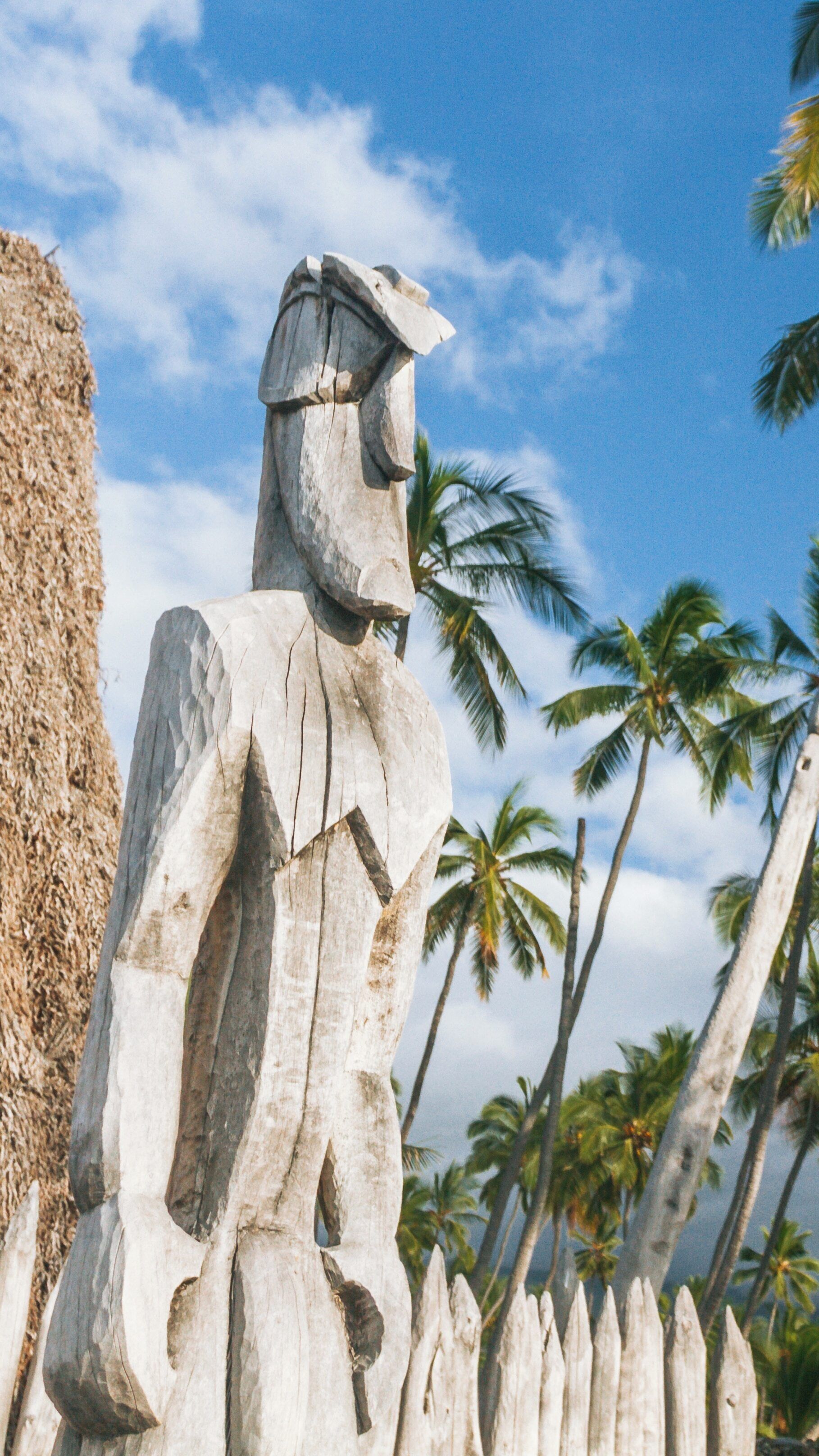 Exploring Pu'uhonua o Honaunau National Historical Park with Hawaiian culture, ancient carvings, and tropical landscapes