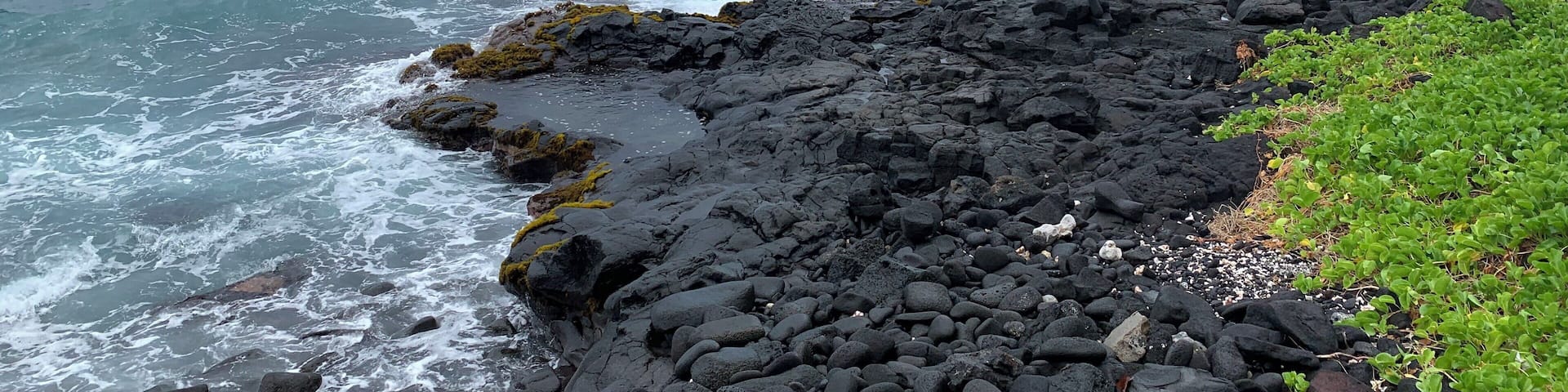 Volcanic rocks along the coast and expanding the size of the island from time to time. Power of nature creating more land ...