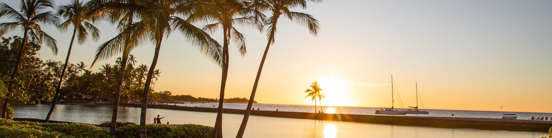 Waikoloa which includes tropical scenes, general coastal views and a sunset