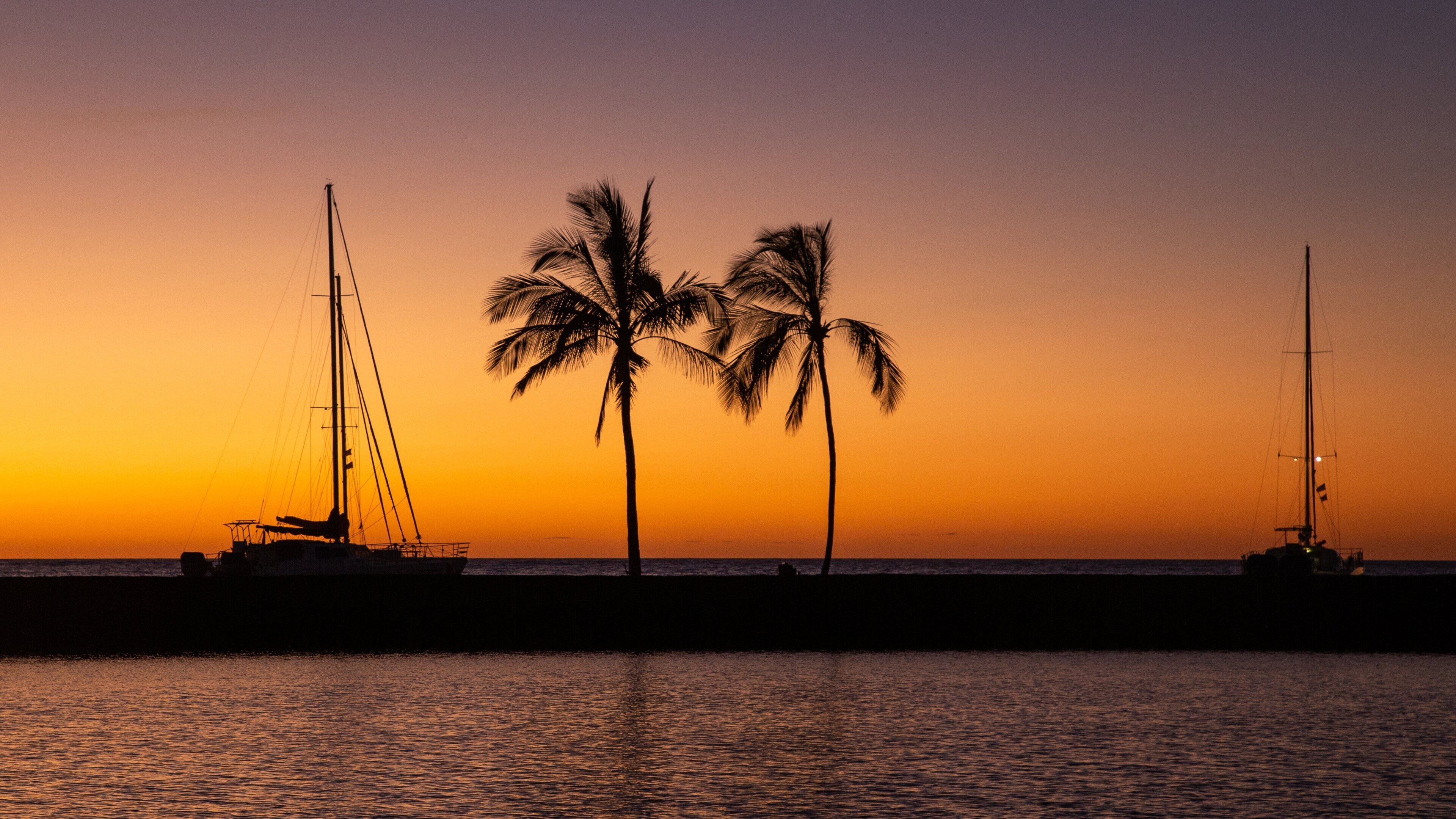 Waikoloa showing sailing, a sunset and tropical scenes