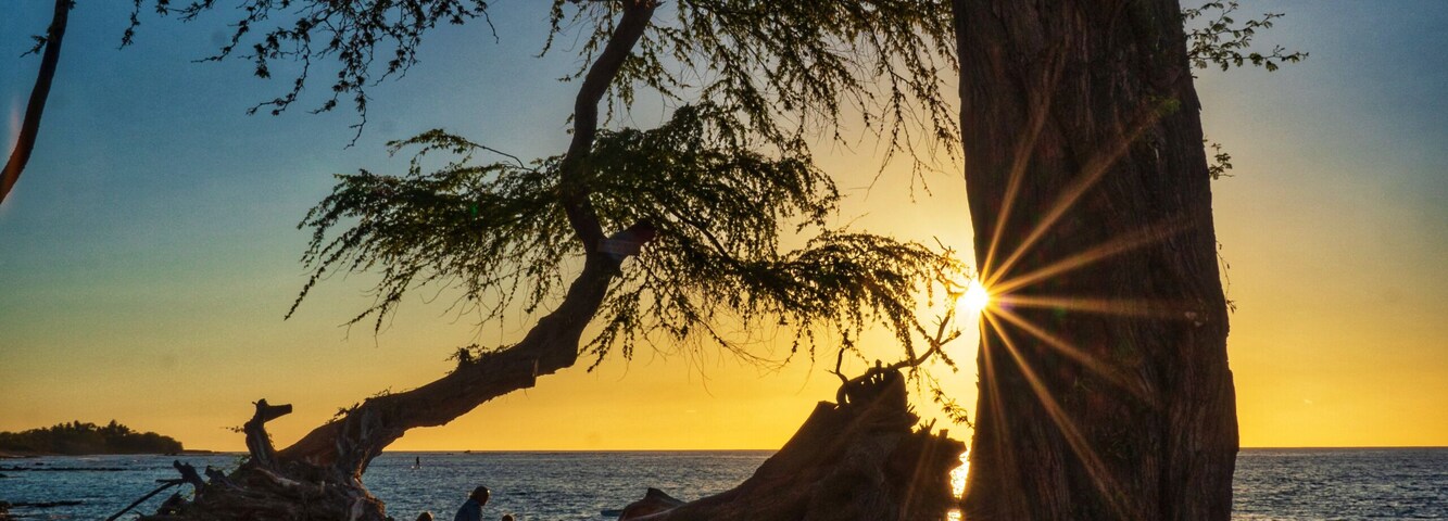 Beautiful sunstar at sunset on the Hapuna beach big island hawaii