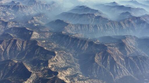On a flight from Seattle to Sun Valley it was possible to see the accumulation of smoke in the valleys from forest fires currently burning all over the Northwest.