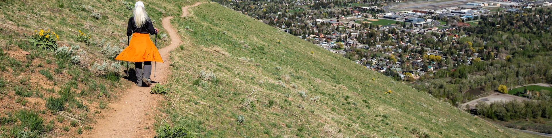 USA, Idaho, Hailey, Senior blonde woman hiking on Carbonate Mountain trail