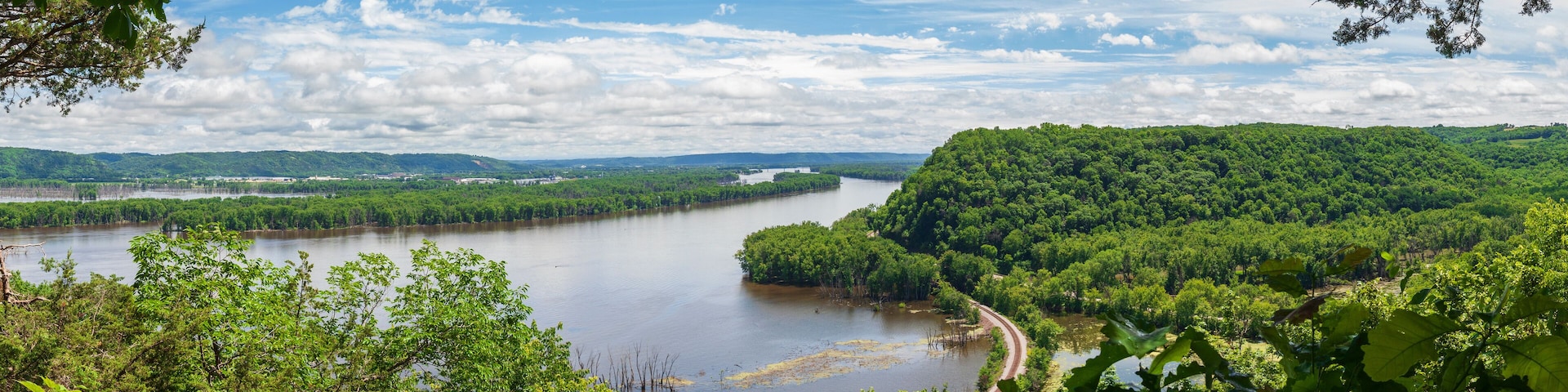 Panorama of Mississippi River viewed from the bluffs at Effigy Mounds National Monument on a bright summer day