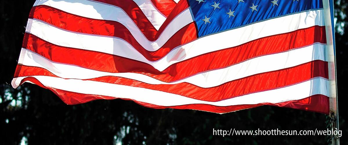 An American flag waving in the wind.