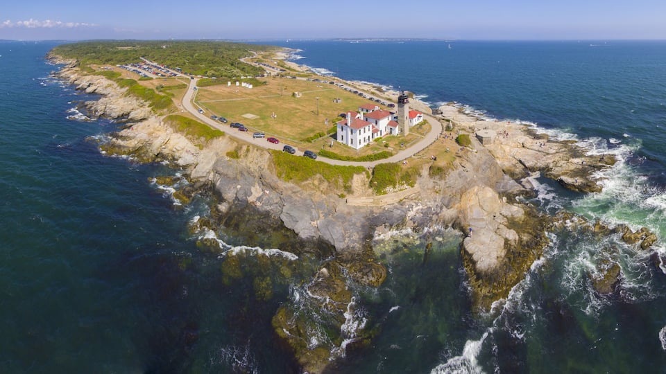 Beavertail Lighthouse in Beavertail State Park aerial view in summer, Jamestown, Rhode Island RI, USA. This lighthouse, built in 1856, at the entrance to Narragansett Bay on Conanicut Island.