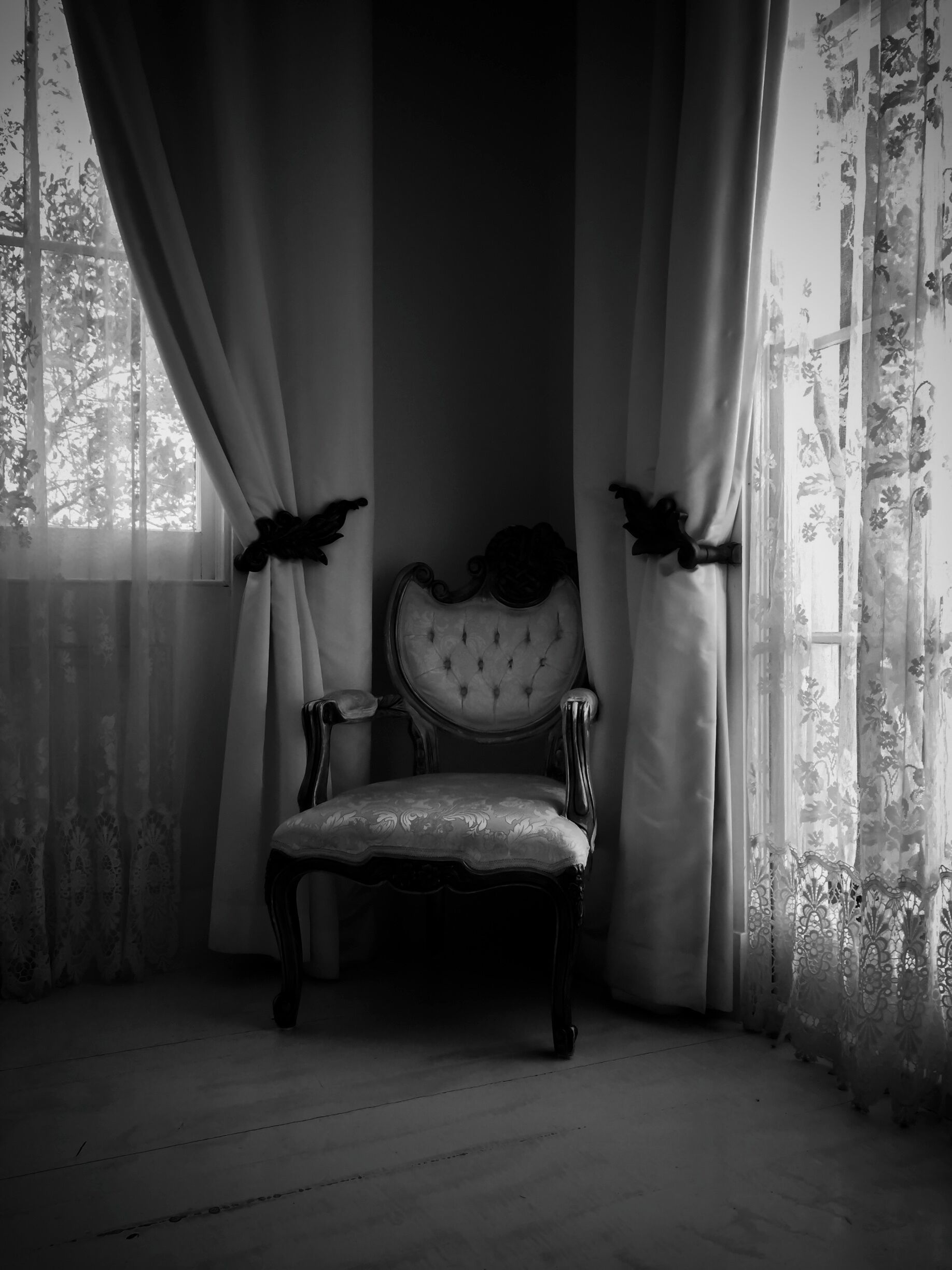 Nottoway Plantation!  If you have not driven Plantation Alley in Louisiana then you need to.  Put it on the next trip or bucket list!  Nottoway is amazing!  The house is beautiful and so are the grounds!  The tour guide we had was great!  He was very enthusiastic and was very knowledgeable!  I recommend it highly!  

This was taken in the White Ballroom.  I just loved the way the lace and the pattern from the chair came out with the black and white processing.