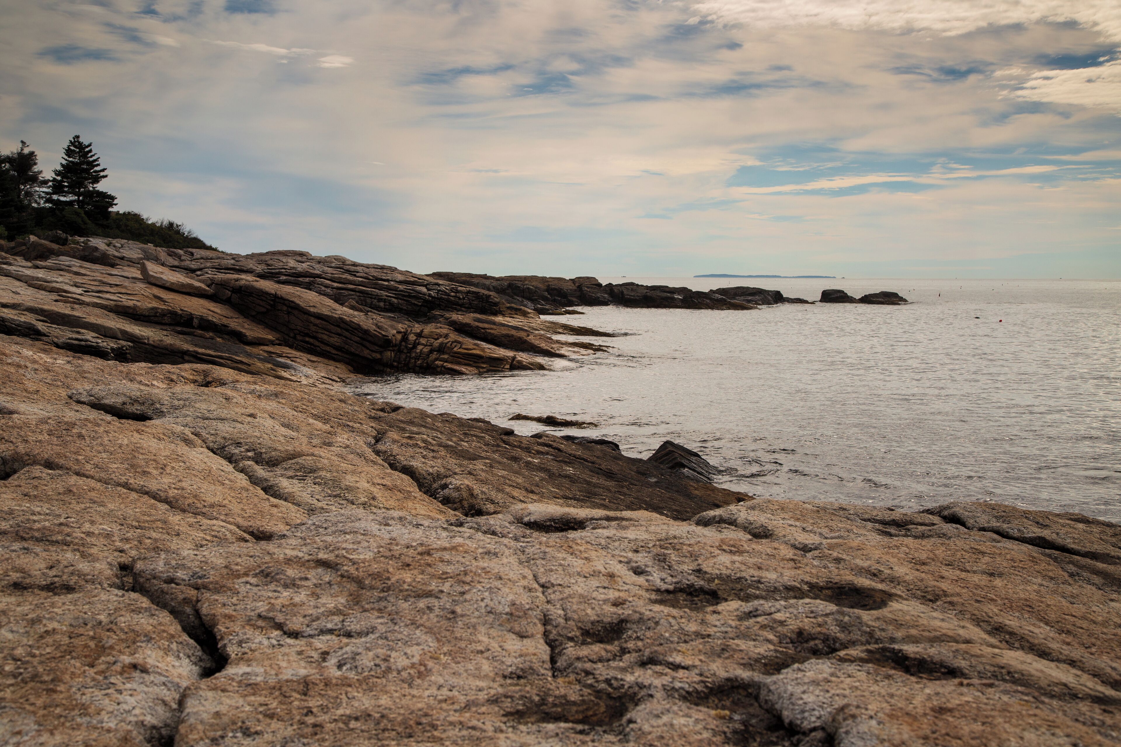 Stumbling along the rocky coast with a 20kg backpack, I found this beautiful pattern of rocks jutting out into the Atlantic Ocean -- my own little version of Land's End.