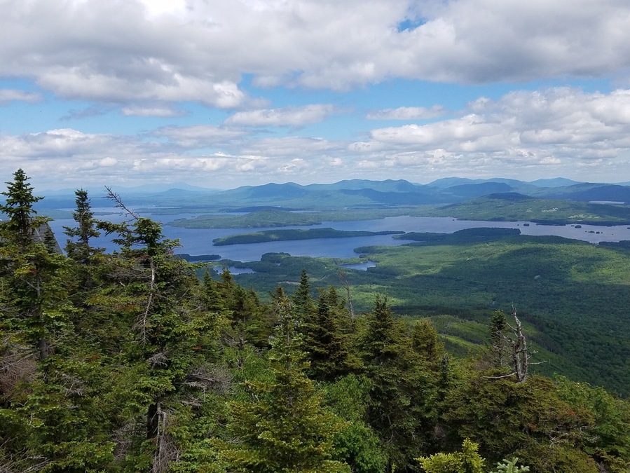 View of Moosehead Lake from the peak of Big Moose Mountain in ME. It's a tough 4.5 mile hike up a rocky creek bed with 2,000 feet in elevation gain but the view from the top is great!