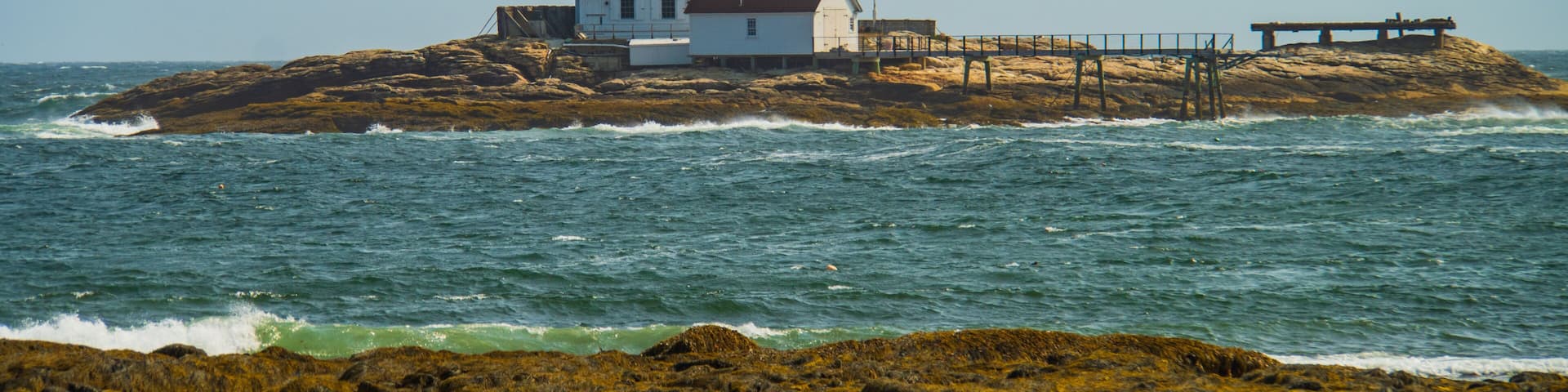 Cuckold Lighthouse built in 1896 at the entrance to Boothbay Harbor visible from the tip of Southport Island