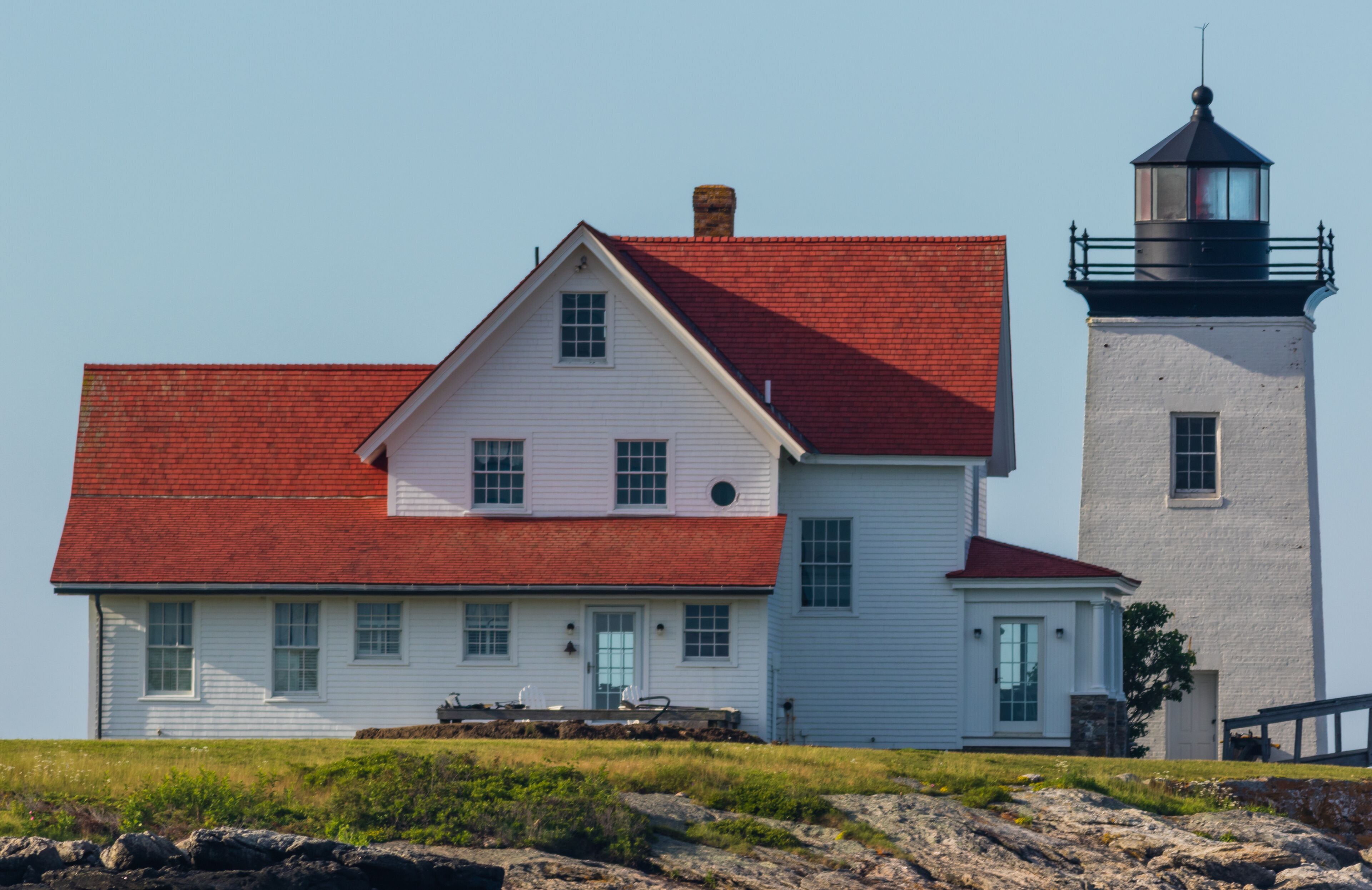 Hendricks Head Lighthouse in Southport, Maine marks the west side of the Sheepscot River, on a summer morning from kayak pov
