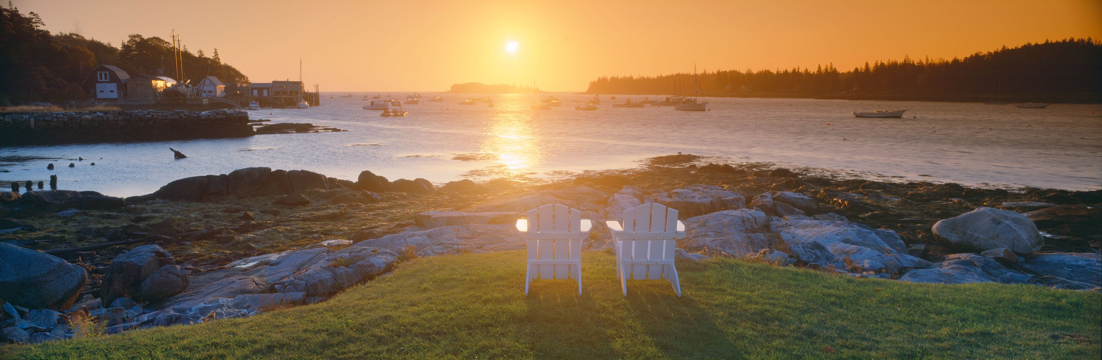 Lawn chairs at sunrise at Lobster Village, Tenants Harbor, Maine
