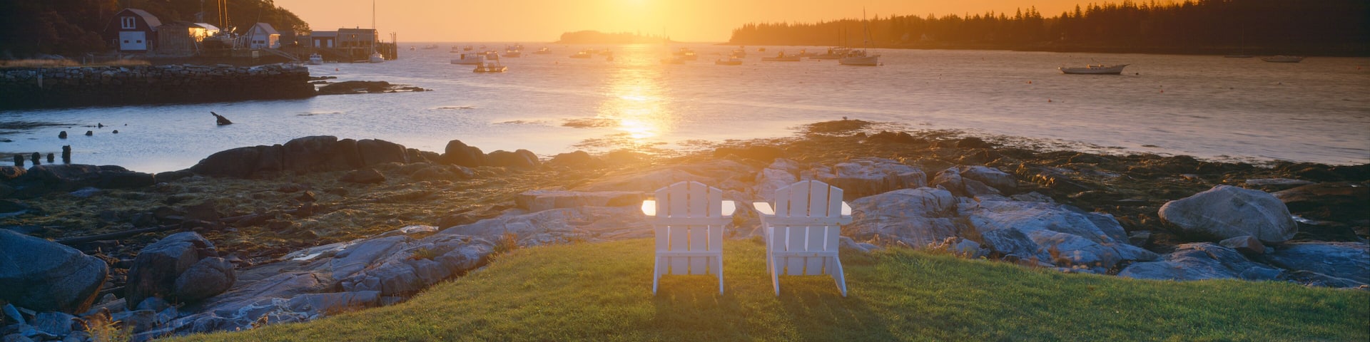 Lawn chairs at sunrise at Lobster Village, Tenants Harbor, Maine