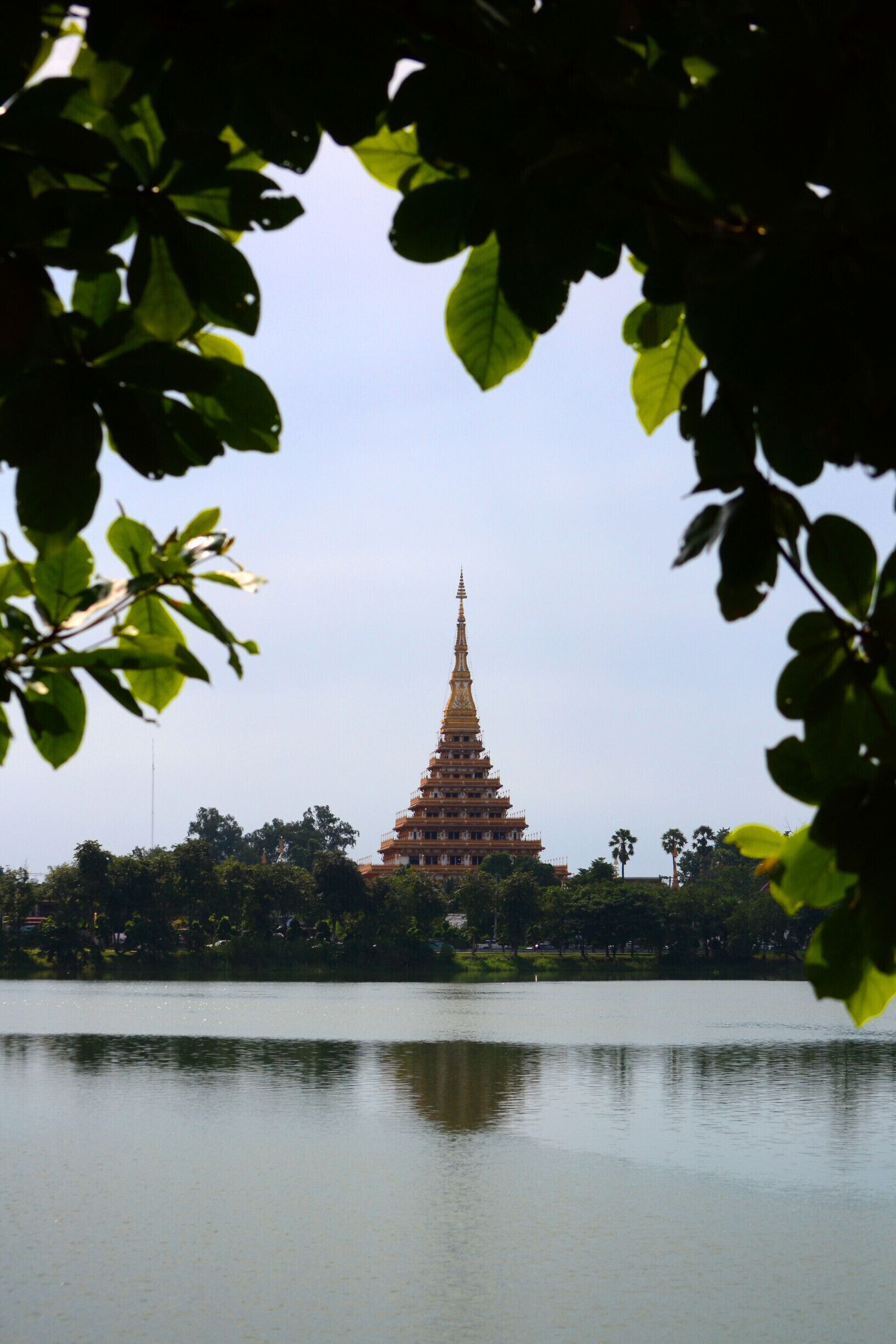 Wat Nong Wang, the tallest temple in E-san, overlooks Bung Kaenakorn, a sizable lake and surrounding park. Visitors to the temple may climb to the 9th floor to observe the bustle of the city or to pray. The way to the top winds past historic offerings and moralistic murals as well as the personal effects of important monks. The view is worth the climb but if you're tall, watch your head.

#architecture #green