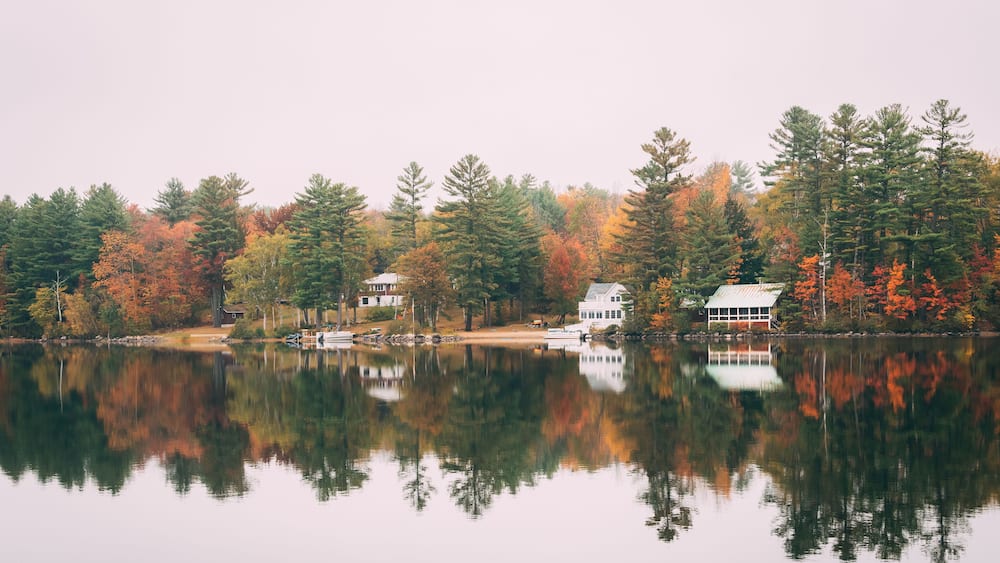 Wilson Lake with autumn color, in Wilton, Maine