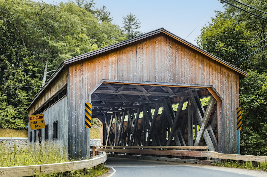 Historic Bissell Covered Bridge in Charlemont, Massachusetts, USA, a reconstructed wooden bridge spanning Mill Brook