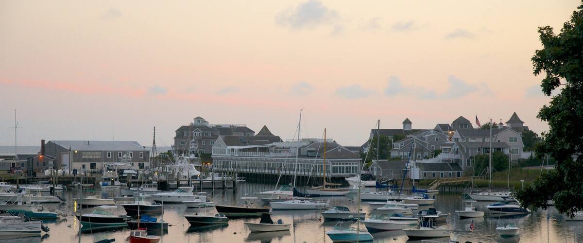 Harwich featuring boating, a bay or harbor and a sunset