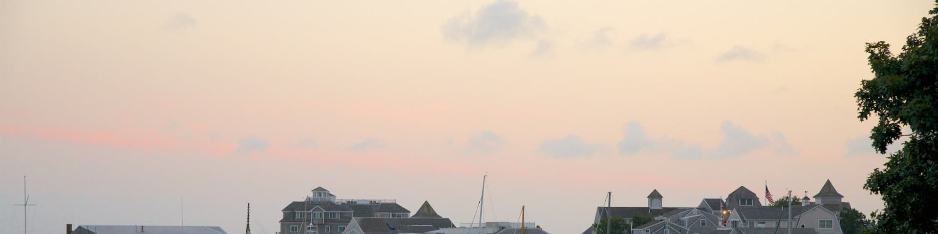 Harwich featuring boating, a bay or harbor and a sunset