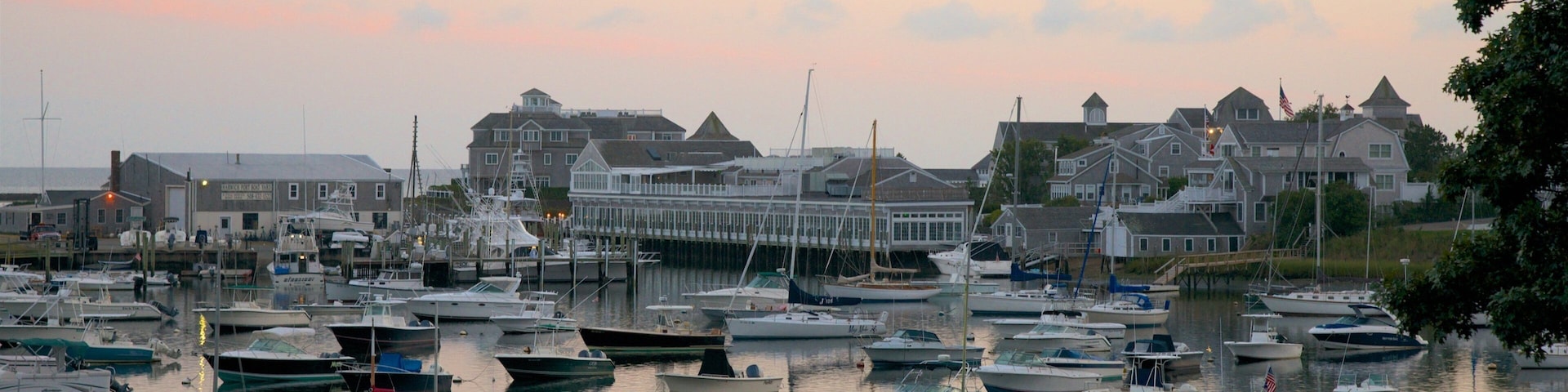 Harwich featuring boating, a bay or harbor and a sunset