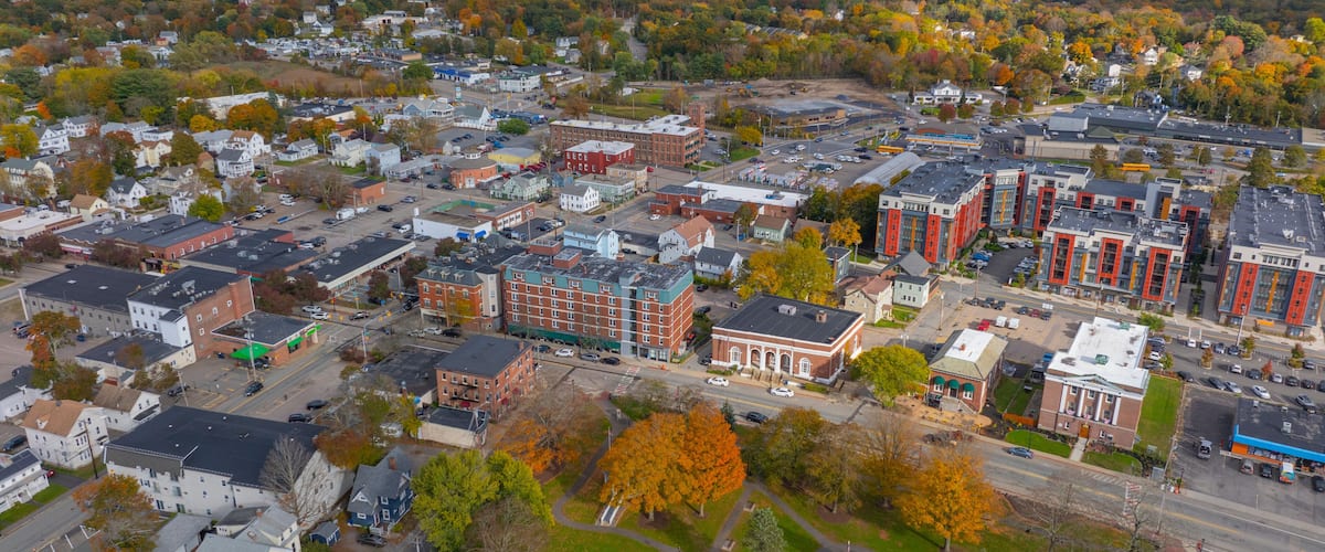 North Attleborough historic city center aerial view in fall on Washington Street at town common, city of North Attleborough, Massachusetts MA, USA.