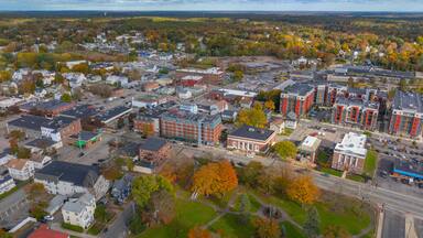 North Attleborough historic city center aerial view in fall on Washington Street at town common, city of North Attleborough, Massachusetts MA, USA.